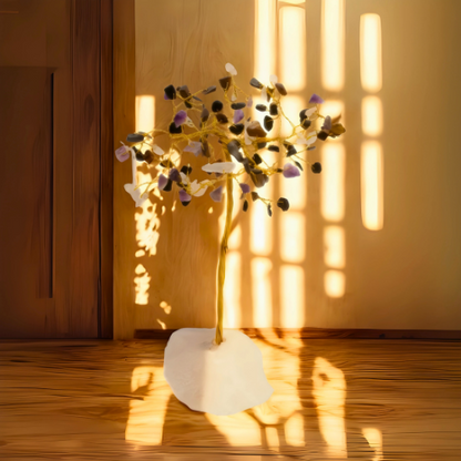 Decorative plant in a white vase on a wooden floor with sunlight casting shadows on the wall.